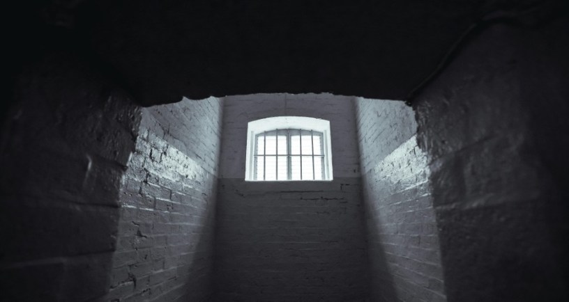 Prison cell. Photo by Jimmy Chan: https://www.pexels.com/photo/hallway-with-window-1309902/
