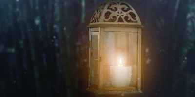 photo of brown candle lantern