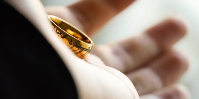 Ring of Sauron in open palm photo by Ergo Zakki/Unsplash, tolkien's easter joke