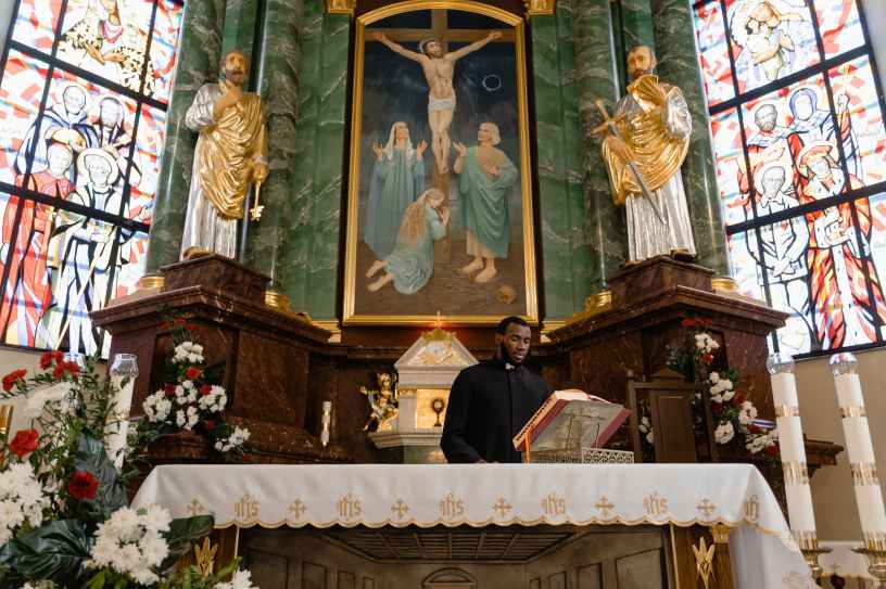a priest celebrating a holy mass