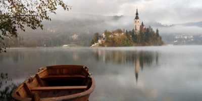 boat by Slovenian lake to illustrate young adult fantasy novels.