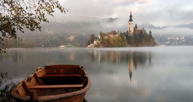 boat by Slovenian lake to illustrate young adult fantasy novels.