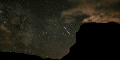 Moutain silhouettes with night sky. Photo by Emma Dau on Unsplash. https://unsplash.com/photos/silhouette-of-mountain-under-clouds-I21ZchrZO9E