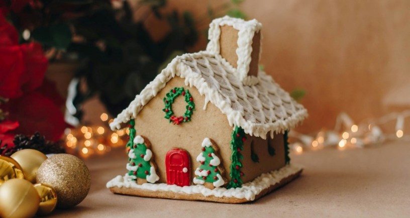 Gingerbread house. https://unsplash.com/photos/a-gingerbread-house-decorated-with-christmas-decorations-hxOg4o5oNFA