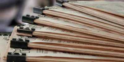 Piles of documents bureaucracy committees