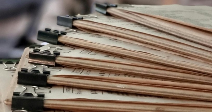 Piles of documents bureaucracy committees