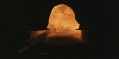 Melting metal in forge